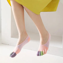 Load image into Gallery viewer, Person wearing pink and purple gradient toe socks with a yellow skirt.