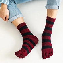 Load image into Gallery viewer, Red and black striped toe socks worn by a person on a white background