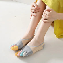 Load image into Gallery viewer, Person wearing colorful five-finger socks on a light background