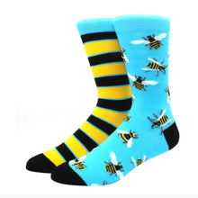 Load image into Gallery viewer, Two pairs of socks with bee patterns on a white background