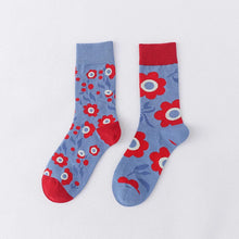 Load image into Gallery viewer, Pair of socks with red floral pattern on a light gray background
