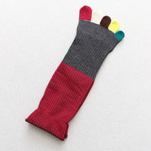 Load image into Gallery viewer, Colorful knitted sock with multicolored tips on a light gray background