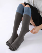 Load image into Gallery viewer, A pair of grey knee-high socks with distinct toe separation, designed for comfort and reducing toe friction.