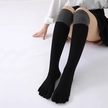 Load image into Gallery viewer, A pair of black knee-high socks with distinct toe separation, designed for comfort and reducing toe friction.