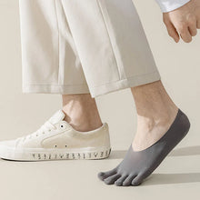Load image into Gallery viewer, Person wearing white sneakers with text and gray toe socks on a neutral background
