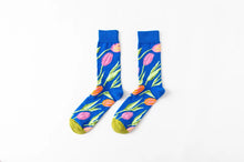 Load image into Gallery viewer, Colorful socks with floral design on a white background