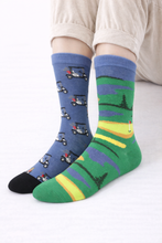 Load image into Gallery viewer, Colorful socks with golf-themed designs on a white background