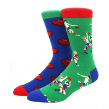 Load image into Gallery viewer, Two socks with sports-themed designs on a white background
