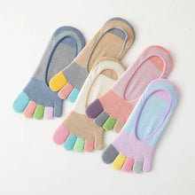 Load image into Gallery viewer, Set of colorful toe-separated socks on a light gray background
