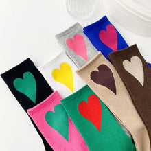 Load image into Gallery viewer, Colorful socks with heart designs on a white background
