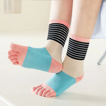 Load image into Gallery viewer, Colorful toe-separated socks worn by a person on a light background
